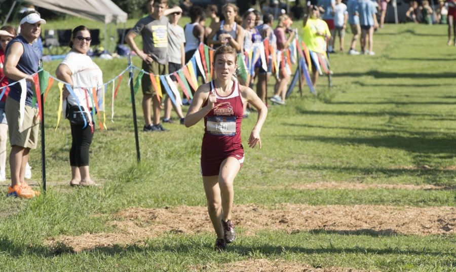Sociology sophomore Sasha Solano-McDaniels runs. Solano-McDaniels captured her first individual victory of her collegiate career at the Major Blazer Invitational. Photo credit: Loyola New Orleans Athletics