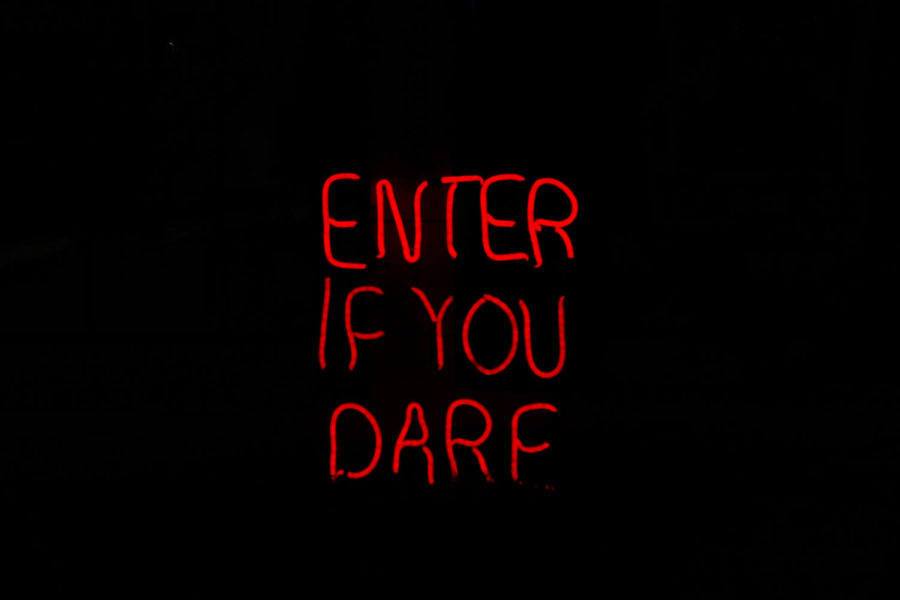 The Enter if You Dare sign sat outside of a palm reading tent at Scout Island Scream Park. The sign set the tone for park, as only those who are brave should risk entering in the attractions. Photo credit: Erin Haynes