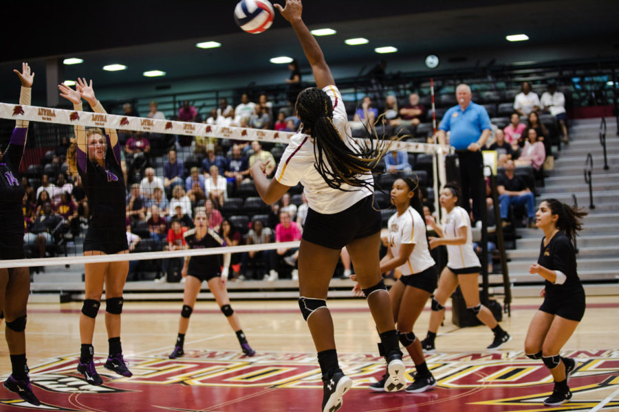 General+studies+freshman+Jordan+Bernard+goes+for+a+kill+in+the+home+opener+against+Bethel+University.+Bernard+led+the+team+in+kills+against+Faulkner+University+with+13+kills.+Photo+credit%3A+Julia+Santos