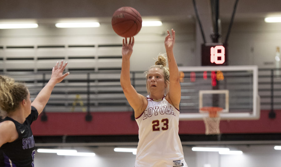 Psychology+and+Pre-Health+senior+Megan+Worry+throws+up+a+shot.+Worry+finished+with+nine+points+against+Northwestern+State+University.