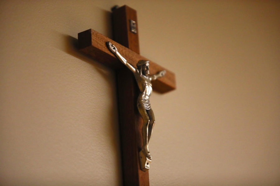A crucifix hangs on a classroom wall in a room in the Communication/Music Complex. Two priests with ties to Loyola University New Orleans were named in a list of clergymen that have a history of accusations of sexual abuse of minor. Photo credit: Cristian Orellana