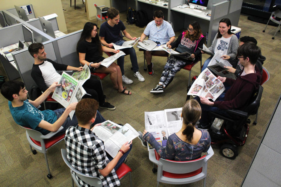 Part+of+The+Maroon+editorial+board+sits+and+discusses+the+latest+issue+of+the+newspaper.+Photo+credit%3A+Andres+Fuentes