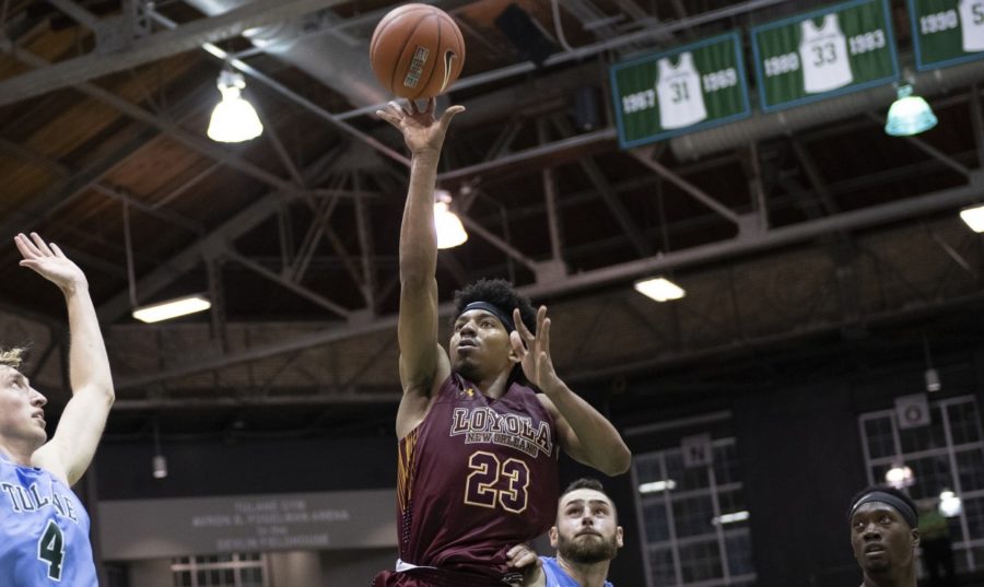 Mass communication Zach Wrightsil nearly records a triple-double with 27 points, 14 rebounds and nine assists. Photo credit: Loyola New Orleans Athletics