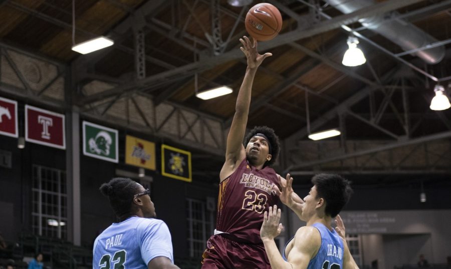 Communication freshman  Zach Wrightsil looks to lay in a basket versus Tulane University. Photo credit: Kyle Encar