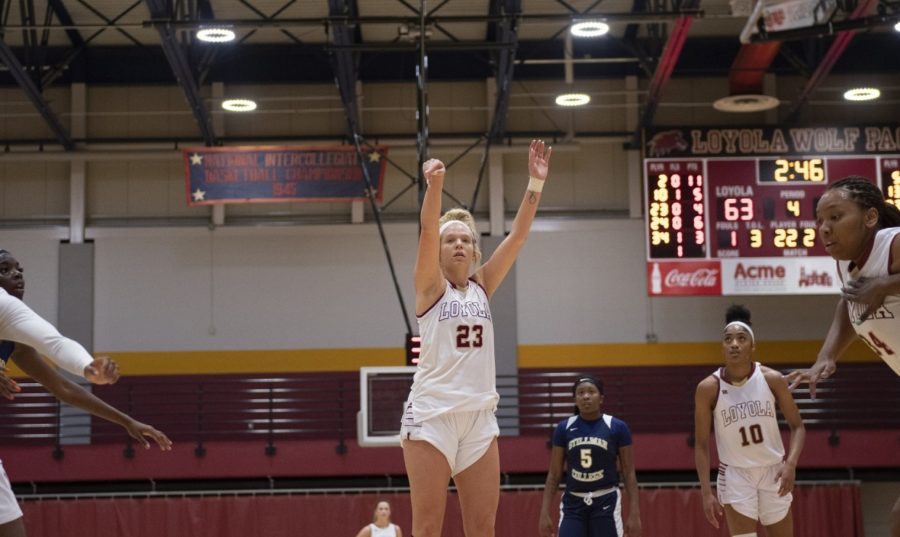 Psychology senior Megan Worry (23) had a career night, leading the team in points, rebounds and assists. She finished with 12 points, 12 rebounds and five assists Photo credit: Loyola New Orleans Athletics