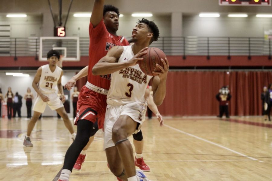 Mass communication freshman Myles Burns (3) recorded his seventh double-double this year in a win versus Florida College. Loyola won at home, 96-89. Photo credit: Andres Fuentes