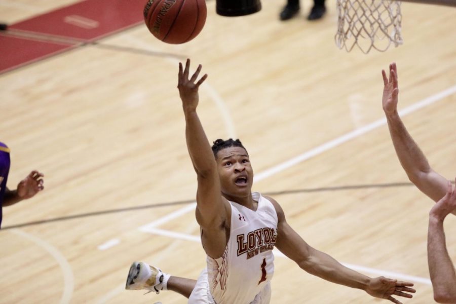 Freshman Cameron Dumas (1) lays up a shot in The Den versus Bethel University on Feb. 14. Loyola enters the conference tournament as the No. 4 seed. Photo credit: Michael Bauer