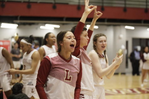 Biology senior Menley Long celebrates after a play in The Den. Long as well as three other seniors started in their last game at The Den. Photo credit: Andres Fuentes