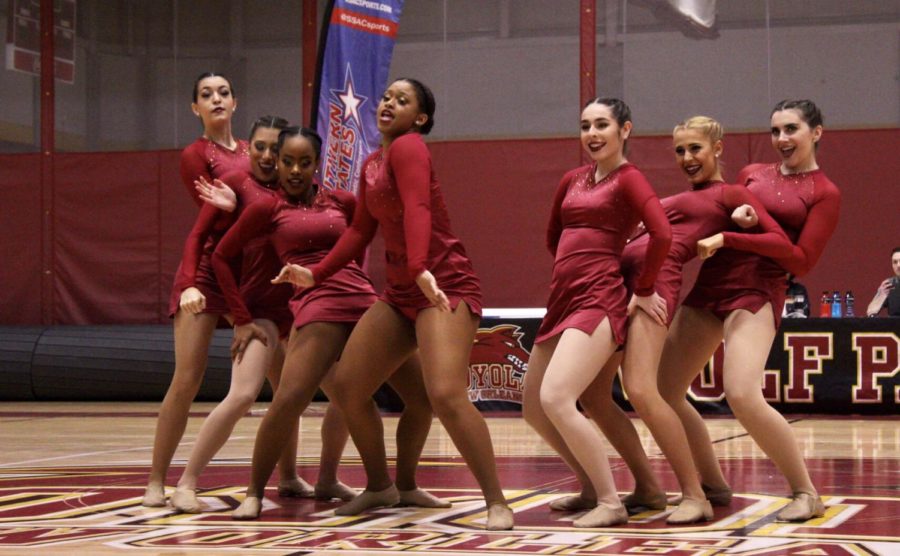 Loyola's dance team strikes a pose during their routine during the conference championship. Photo credit: Ariel Landry