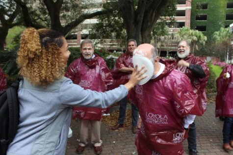 Plates Fly, as Loyola students pie their professors for a cause