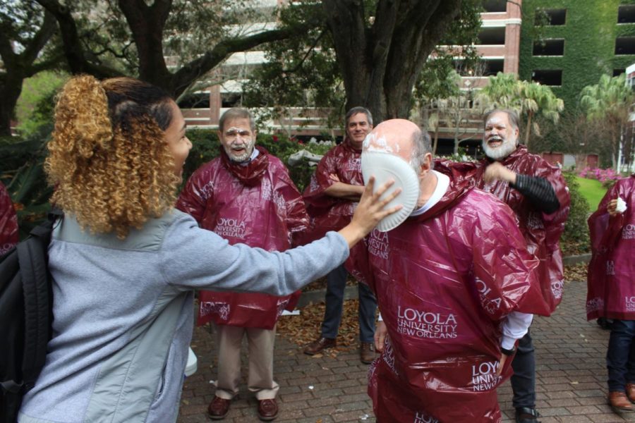 Walter Block, economics professor, recieves a plate of shaving cream to the face on Feb. 26. The pieing was part of a University Honors Association event that asked students to donate $1 to the Gulf Restoration Network in exchange for pieing a participating professor. 