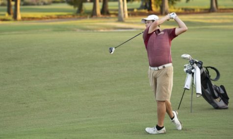 Business senior Philip Nijoka tees off at Audubon Park. Nijoka finished in third place at the Badger Invitational. Photo credit: Loyola New Orleans Athletics