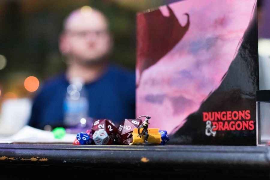 Guests+play+Dungeons+and+Dragons+at+d4+Gaming+Cafe.+Owners+Mark+and+Tracy+Meyer+brought+the+cafe+to+Oak+Street+in+late+March+2018.+Photo+credit%3A+Michael+Bauer