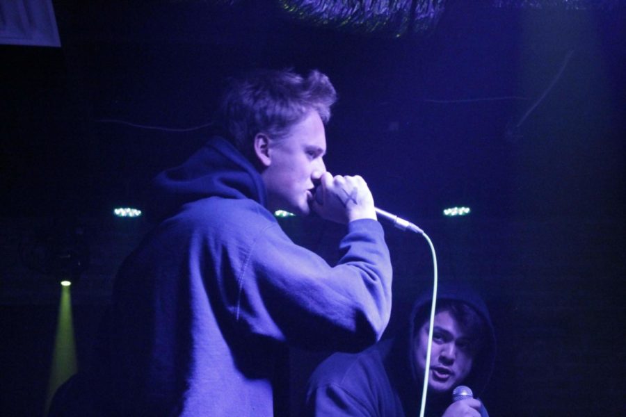 Max Taylor and Niccolo Short, two Loyola rappers, collaborate onstage.