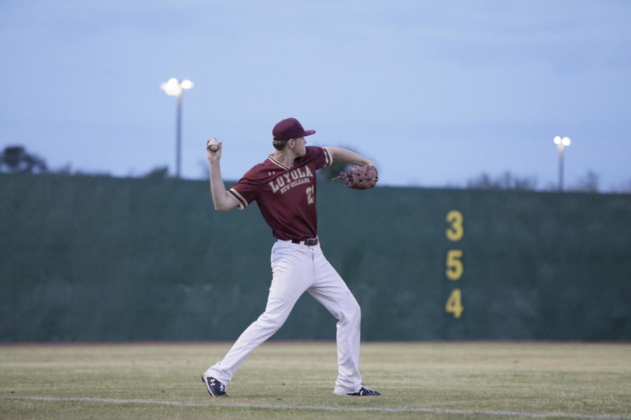 A Loyola baseball player warms up before a home game at Segnette Field. Loyola is now on a six-game losing streak. Photo credit: Andres Fuentes