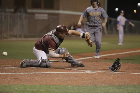 Biology sophomore Gabriel Trastoy misses a throw to home plate, causing Bethel to score in Game 2. Loyola would drop three straight games to the Wildcats. Photo credit: Andres Fuentes