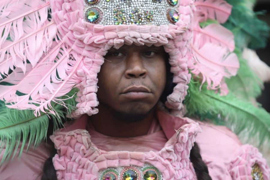 A member of the Wild Tchoupitoulas wears his traditional outfit for 3rd Friday in the Peace Quad on Feb. 15, 2019. Mardi Gras Indians have a tradition rooted in the holiday.