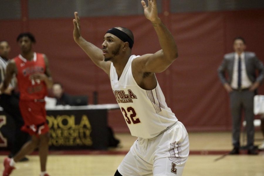 Accounting senior Benjamin Fields (32) plays on the defensive side at a Loyola home game. Fields' last-minute shot sent Loyola to the second round of the national tournament. Photo credit: Andres Fuentes