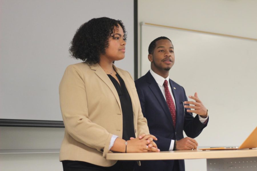 Jessamyn Reichman and Freedom Richardson discuss their policies at the SGA debate on March 12, 2019. The candidates for president, vice president, and senators all participated in the debate. Photo credit: Cristian Orellana