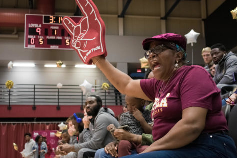 A Loyola fan cheers on the women's basketball team versus Bethel University on Feb. 14, 2019. Both teams will be competing in the national tournament this year. Photo credit: Michael Bauer
