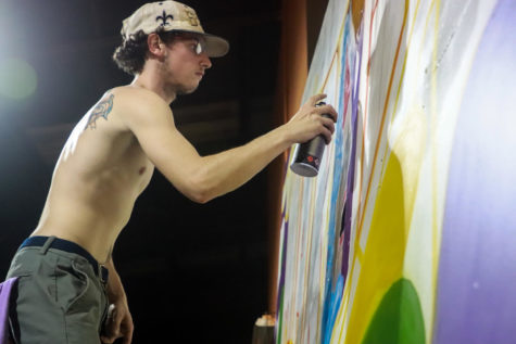 Loyola student makes his mark on local mural