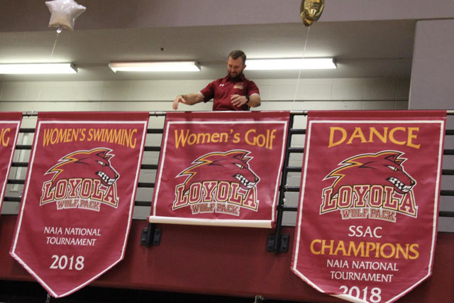 Banners+were+hung+for+the+dance+team%2C+the+women%E2%80%99s+golf+team+and+both+swim+teams+at+Senior+Night+on+Feb.+14+2019+for+competing+nationally+last+year.+The+Directors%E2%80%99+Cup+judges+based+on+a+school%E2%80%99s+national+performance.