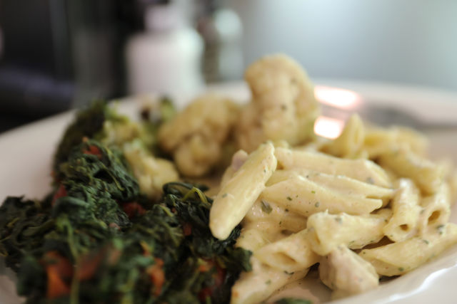 A plate of pasta and spinach is served up in Loyolas Orleans Room. Loyola and Tulane students will be able to use their meal plans at each others campuses for the first time since before the pandemic. File photo.
