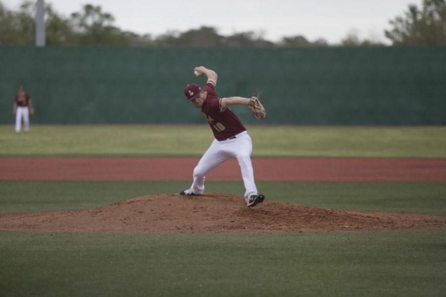 Psychology sophomore Brenden Taravella (10) throws a pitch from the mound at Segnette Field. Loyola lost their final series of the regular season to William Carey. Photo credit: Andres Fuentes