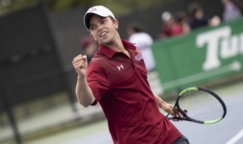 Business sophomore Joseph Short celebrates point. Both tennis teams advanced to the semifinals in the SSAC Championship tournament. Photo credit: Loyola New Orleans Athletics