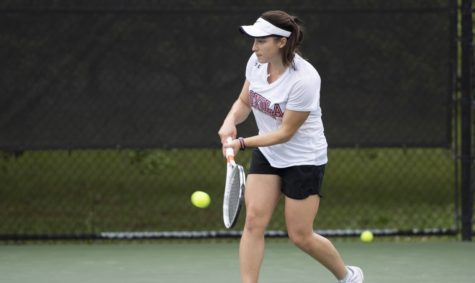 Bio-chemistry sophomore Gabrielle Terranova put the Wolf Pack ahead for the win, marking the fourth victory this season over a ranked opponent. The men's team went scoreless in their match versus Mobile. Photo credit: Kyle Encar