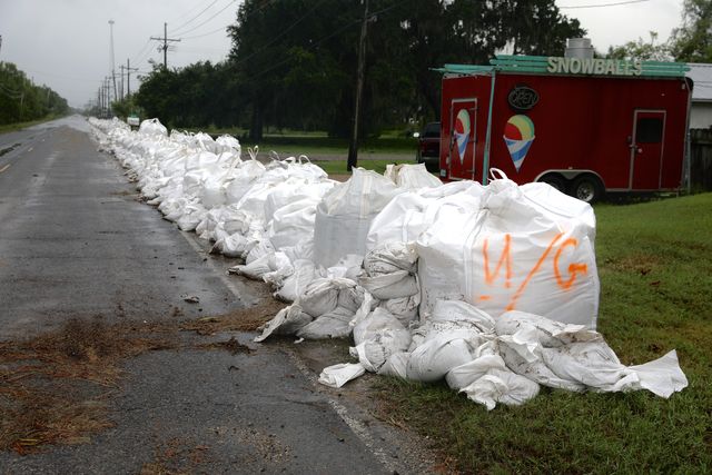 A wall of sandbags lines La. 45 in Jean Lafitte on July 14, 2019. The wall protected homes from flooding as Tropical Storm Barry swept through the area.