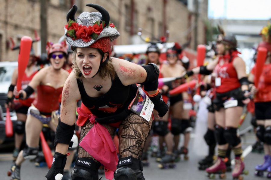 A member of the Big Easy Rollergirls charges the runners of San Fermin in Nueva Orleans on August 25, 2019.
