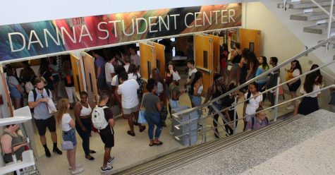 Freshmen scattered around the entrance of the Danna Center. Overcrowding is an issue on people's minds as our student body grows yearly. Cristian Orellana/The Maroon