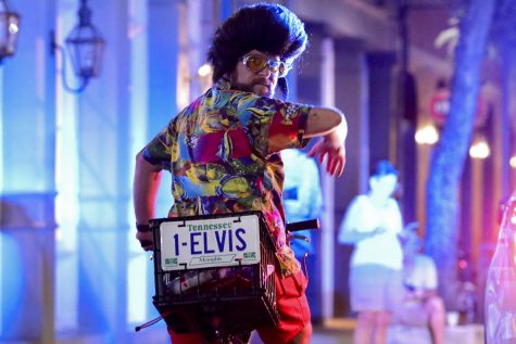 Doug Marshall signals the Krewe of the Rolling Elvi to start their parade near Kerry's Irish Pub on Decatur Street on Aug. 16, 2019.