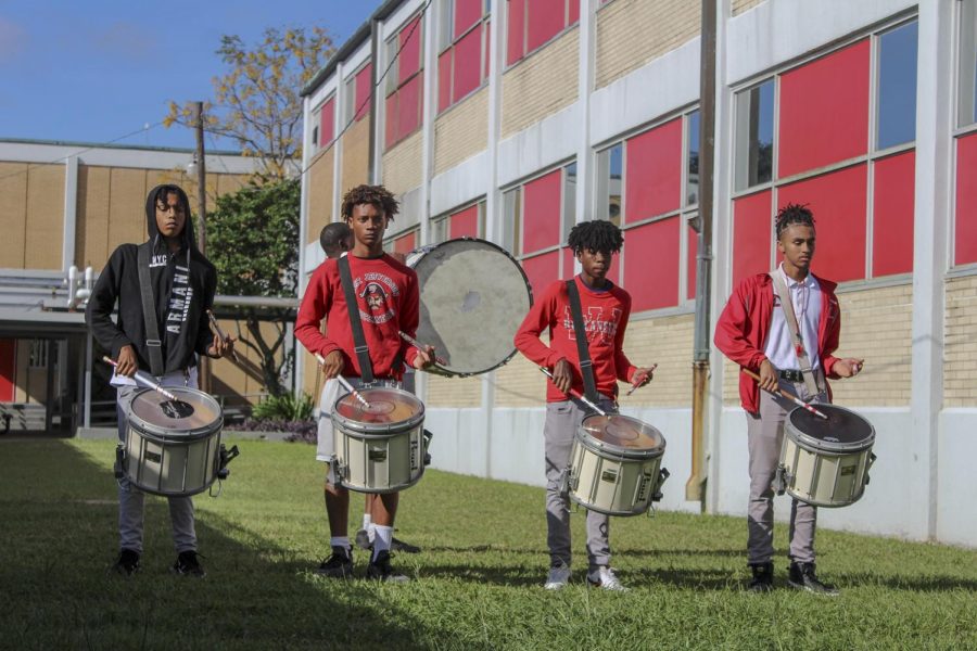 Members of the marching band practice at West Jefferson High School. West Jefferson teacher John Guzda said he has witnessed the effects of education inequality firsthand. Photo credit: Ver Lumod