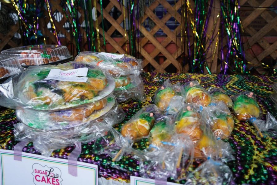 Different varieties of king cake sit in a line at King Cake Hub. This was just a small selection available. Photo credit: Cristian Orellana