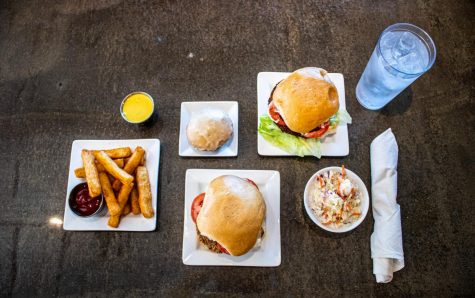Plates of food from Kindred sit on a table.