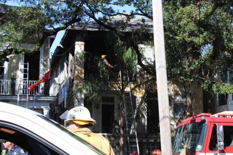 Firefighter extinguish fire at multi-family home.