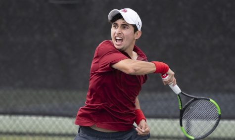 Men's tennis player Ernesto Telles, from San Salvador, El Salvador, battles in match against Jackson State Jan. 25. Telles is one of many international students in the tennis program.