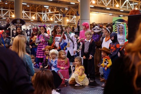 Cosplaying children all pose for a photo after the Children Costume Competition on Jan. 4, 2020. All children that competed won and were offered awards afterward.