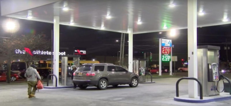 At a gas station, a man walks through the lot where ORhonde Chapmans car was stolen from on Monday Jan. 27 in New Orleans.