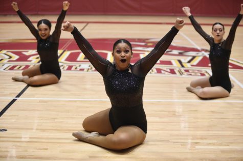 Loyola dance team members perform their conference routine. The dance team placed second out of five teams and earned a chance to compete in the 4th annual National Alliance of Intercollegiate Athletics National Championships. Photo credit: Andres Fuentes