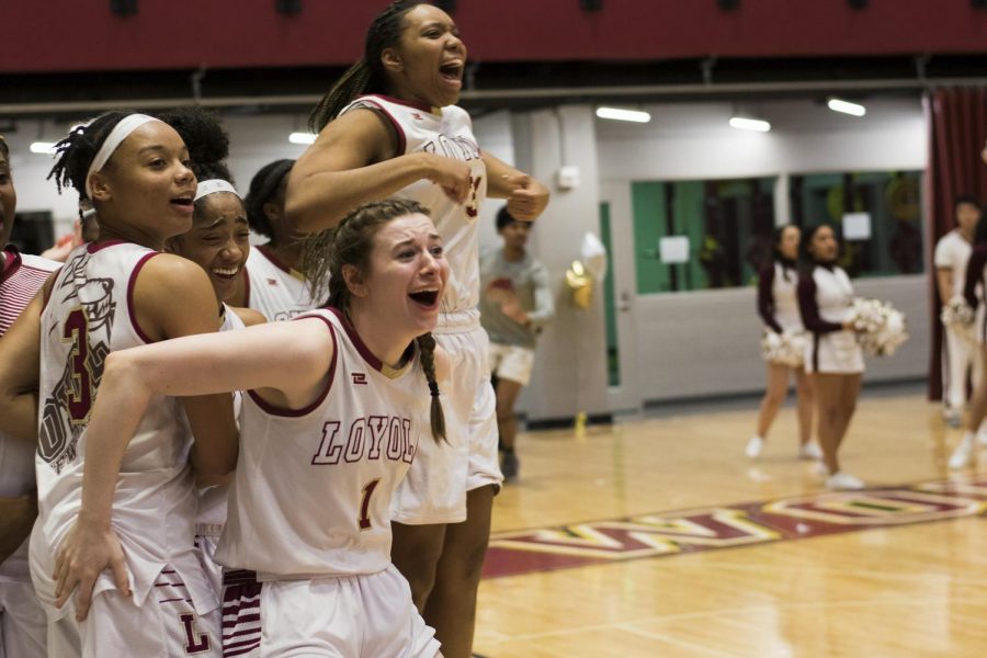 Accounting senior Paige Franckiewicz and the womens team celebrate during a regular season game. Their final season was cut short amid the COVID-19 outbreak. Photo credit: Michael Bauer