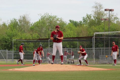 Pitcher Wes Anderson comes to a set as Wolfpack baseball goes over bunt defense. Photo credit: Andrew Wellmann