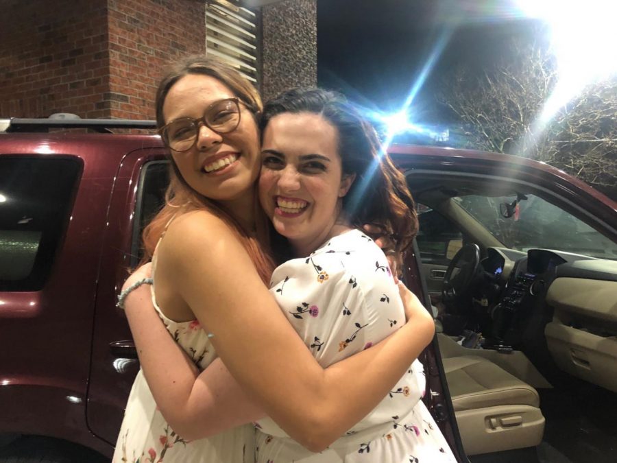 Anna+Folatico%2C+musical+theater+sophomore%2C+hugs+her+friend+Rileigh+Levy%2C+history+sophomore%2C+as+she+leaves+campus+after+school+was+cancelled+due+coronavirus.+Folatico+lives+with+a+condition+that+would+leave+her+vulnerable+to+the+virus.+Courtesy+of+Mackenzie+Ross.