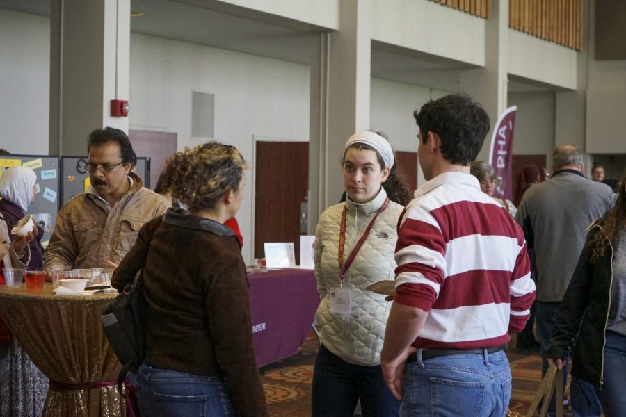 Prospective students talk to Loyola staff members during Admitted Students Day back in March 2020. Due to COVID-19, admissions has had to transition from in-person tours to online marketing techniques in order to recruit graduating high school seniors. Photo credit: Cristian Orellana