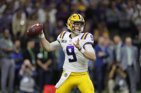 FILE - In this Jan. 13, 2020, file photo, LSU quarterback Joe Burrow throws a pass against Clemson during the second half of the NCAA College Football Playoff national championship game in New Orleans. The Cincinnati Bengals chose Burrow with the first pick in the NFL draft Thursday, April. 23, 2020. (AP Photo/Gerald Herbert, File)