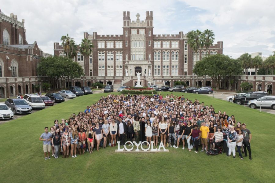 The class of 2020 stands in front of the Loyola sign outside Marquette Hall. The 2020 graduating class had their senior year cut short and honored with a virtual graduation party due to COVID-19. Photo credit: Loyola University New Orleans