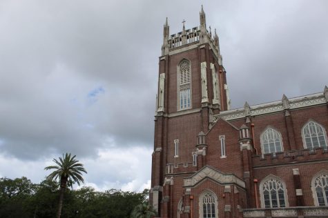 Holy Name of Jesus Church sits under a cloud of fog on May 17, 2020. President Tania Tetlow announced May 20 that the university will resume on-campus classes in August despite the COVID-19 pandemic.