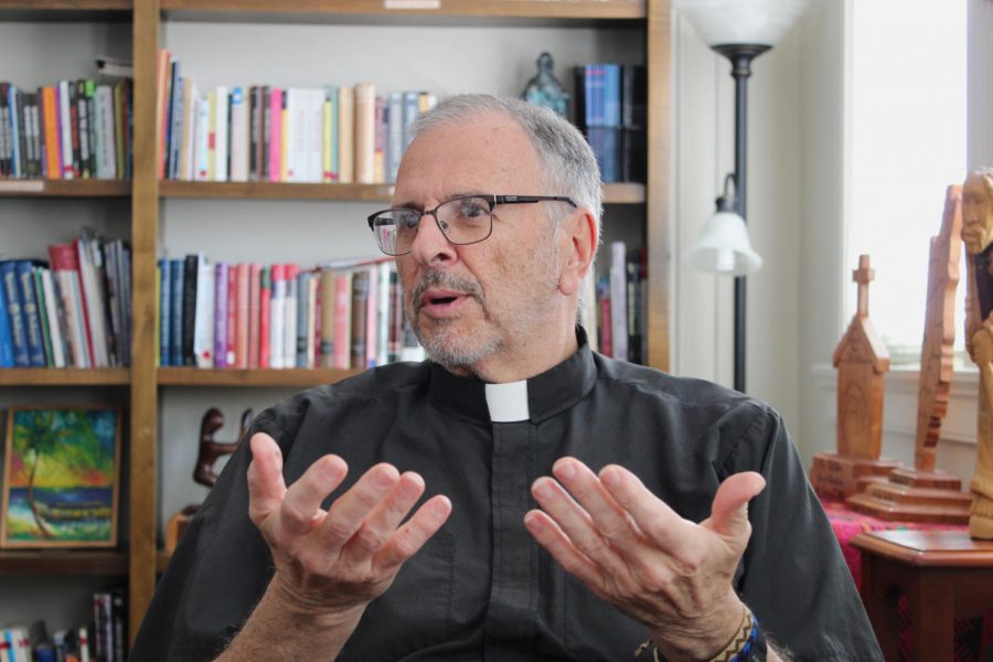The Rev. Ted Dziak, S.J., sits in his office in the Department of Mission and Ministry on March 26, 2018. Dziak announced that he will be gping on a year-long sabbatical as well as resigning from his role as Vice President for Mission and Identity. Photo credit: Jawdat Tinawi Photo credit: Jawdat Tinawi